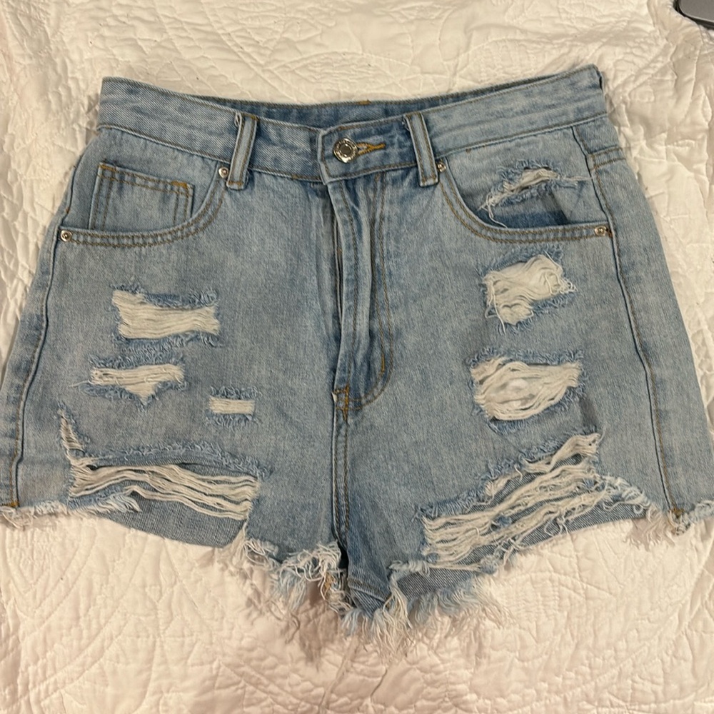 light wash ripped jean shorts